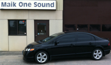 Black 2011 Honda Civic with dark professional window tint